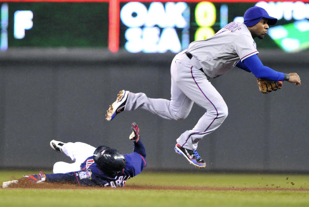 Elvis Andrus completes the double play  