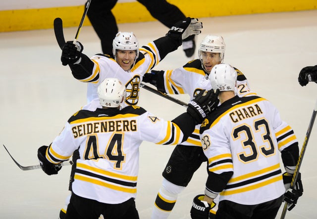 Brian Rolston celebrates his goal  