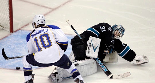 Andy McDonald scores past goalie Antti Niemi  