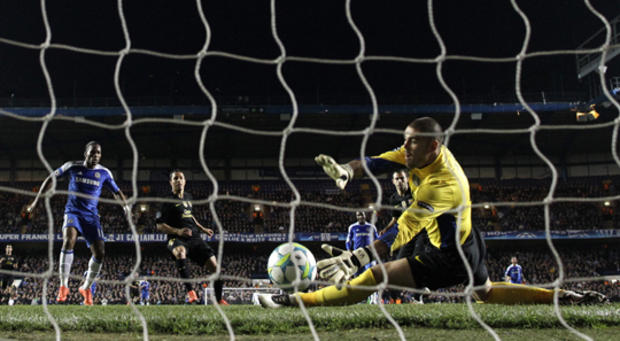 Chelsea's Didier Drogba reacts as he scores a goal  