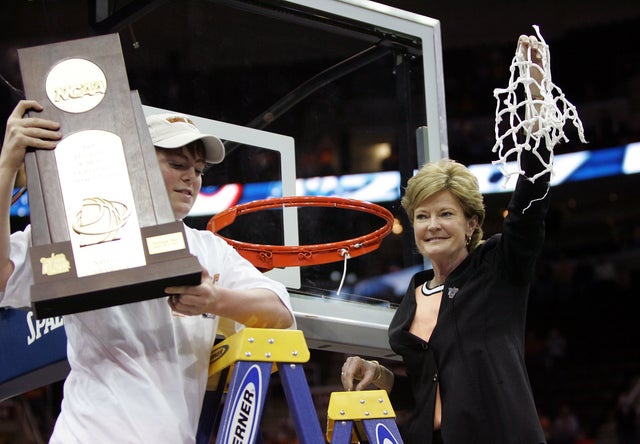 Pat Summitt and her son Tyler celebrate after cutting down  