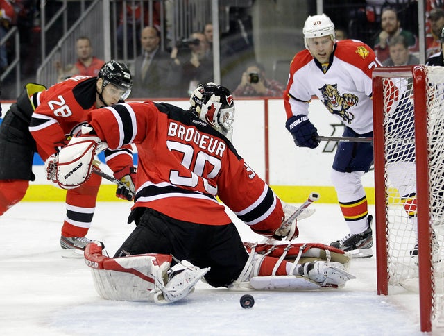 Martin Brodeur blocks a shot 