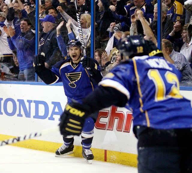 Jamie Langenbrunner celebrates after scoring 