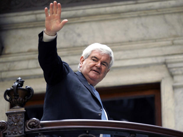 Former House Speaker Newt Gingrich waves to supporters as he leaves a campaign stop in Buffalo, N.Y., April 20, 2012. 