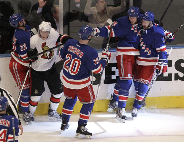 Rangers celebrate a goal by Marc Staal 