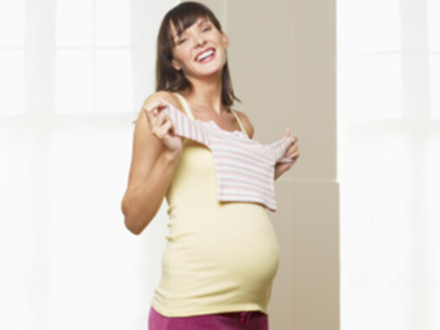 Shopping &amp; Style Maternity Wear, Holding Baby Clothes 