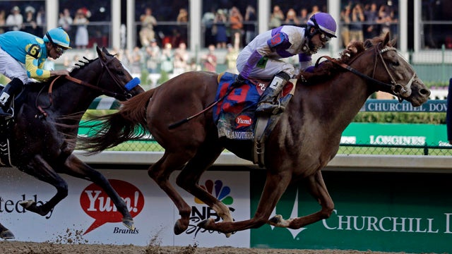 Kentucky Derby and Preakness Stakes winner I'll Have Another is ridden by exercise rider Humberto Gomez at Belmont Park May 21, 2012, in Elmont, N.Y. 