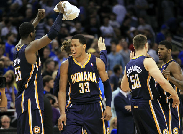 Indiana Pacers players celebrate an overtime win  