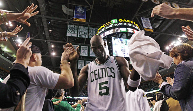 Kevin Garnett is congratulated by fans after defeating the Atlanta Hawks 