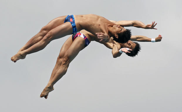 Team China performs during the men's 10-meter platform synchronized finals  