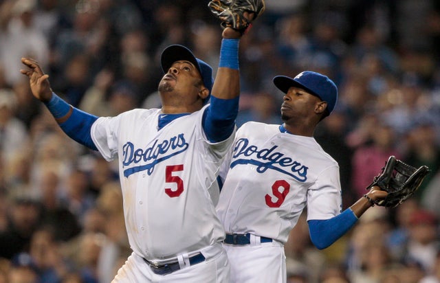 Juan Uribe makes the catch for the last out  