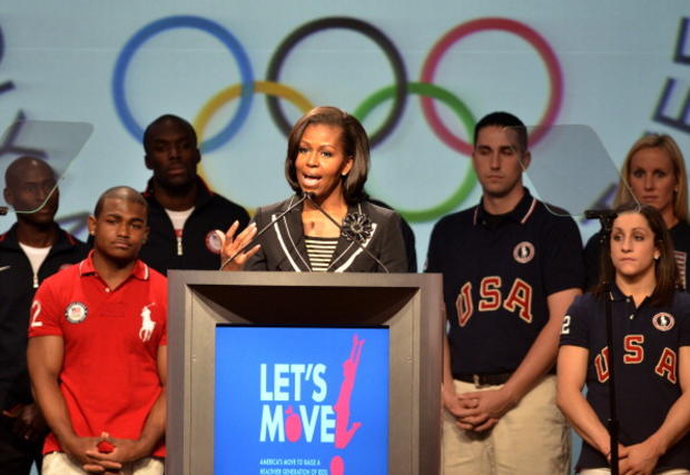 Athletes listen as  US First Lady Michel 
