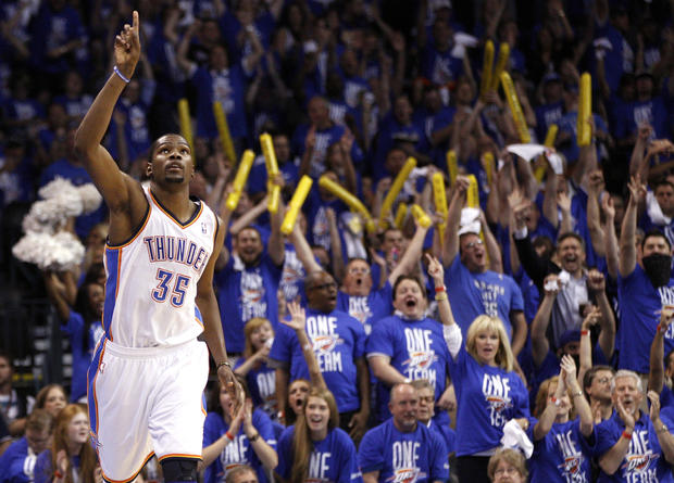 Kevin Durant reacts after hitting a basket 