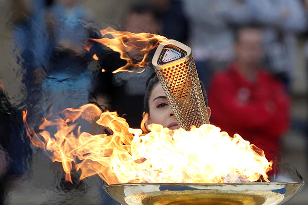 Ino Menegaki lights the torch at a ceremony in Panathinean stadium in Athens 