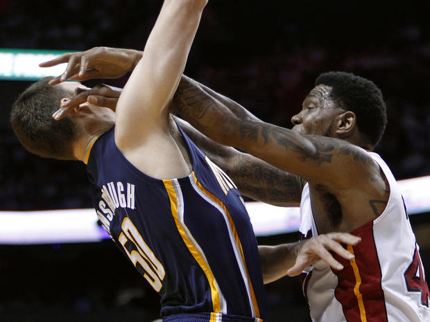Tyler Hansbrough is fouled by Udonis Haslem 