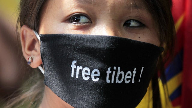 Tibetan exile participates in a protest against Chinese rule over Tibet in New Delhi 