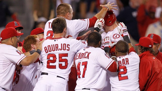 Mark Trumbo celebrates his walk off home run 