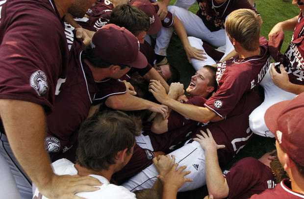Members of the Mississippi State team react after a 3-0 win over Vanderbilt 