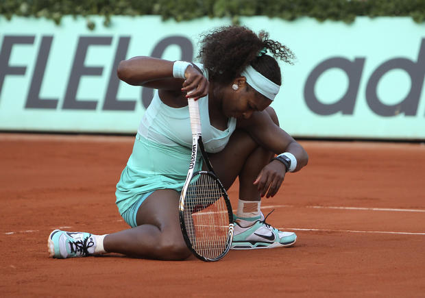 Serena Williams reacts shortly before losing 