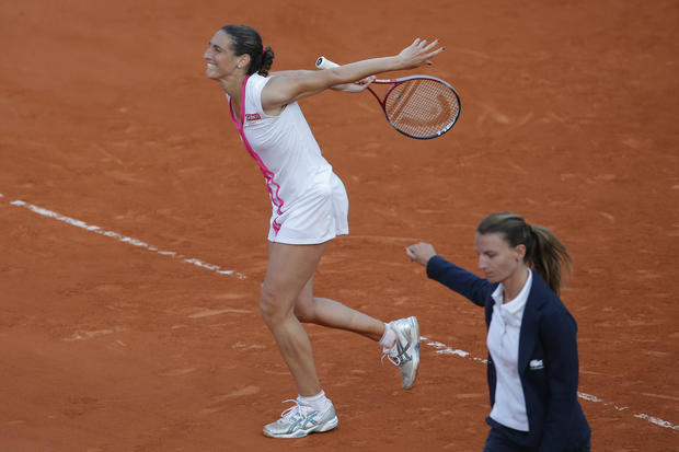 Virginie Razzano celebrates defeating Serena Williams 