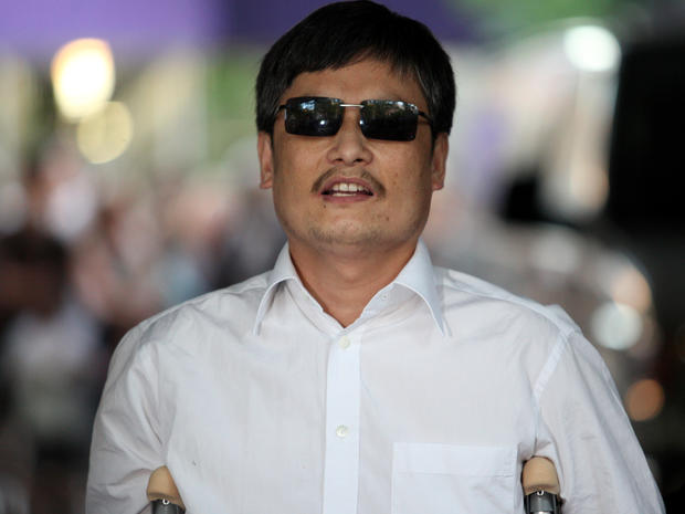 Chinese activist Chen Guangcheng speaks to the media upon arriving on the campus of New York University May 19, 2012, in New York City. 