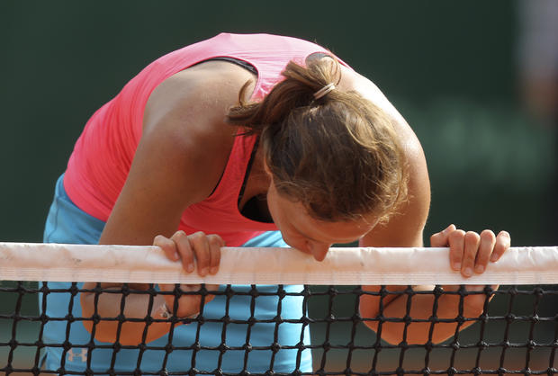 Varvara Lepchenko kisses the net after defeating Serbia's Jelena Jankovic 