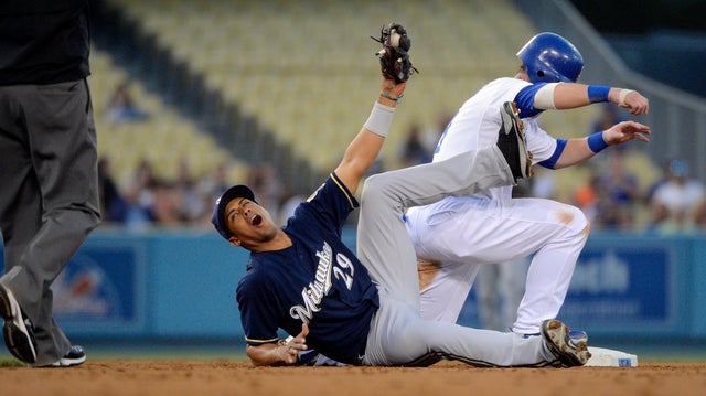 Edwin Maysonet reacts to the call by umpire Todd Tichenor  