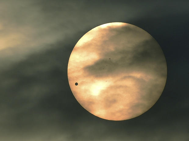 Venus moves across the sun during the transit, as seen from Kunming in southwest China 