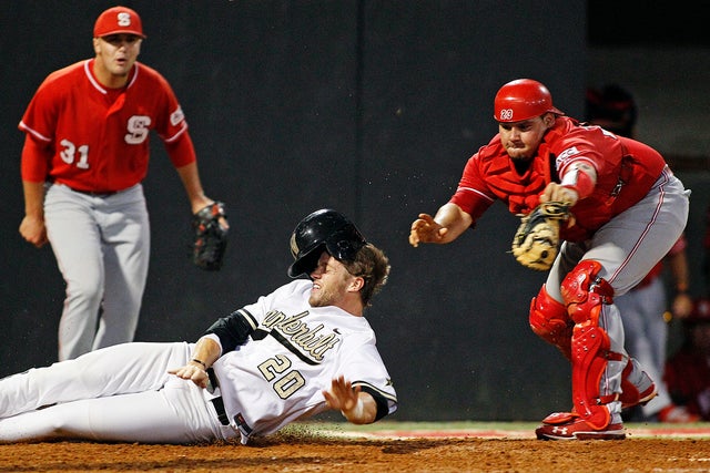 Danny Canela tags out Connor Harrell 