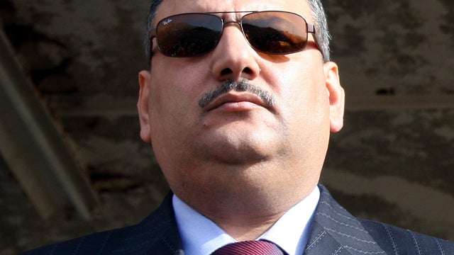 Then-Syrian Agriculture Minister Riad Hijab is seen Nov. 24, 2008, in Quneitra, Syria. 