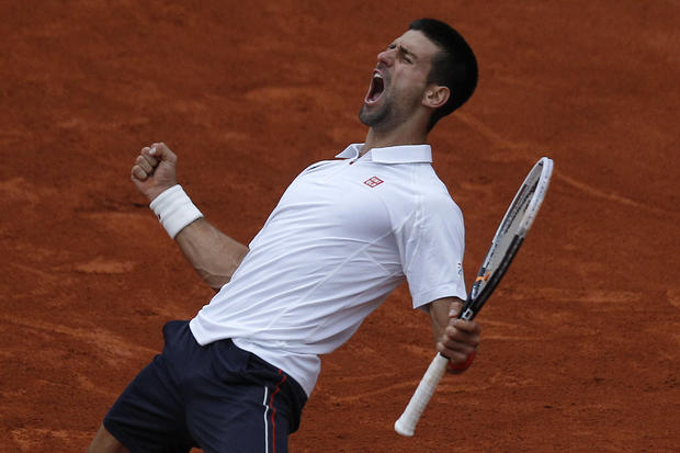 Djokovic eacts as he defeats France's Jo-Wilfried Tsonga 