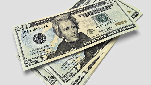 3D render of twenty dollars bills all with sharp focus. 