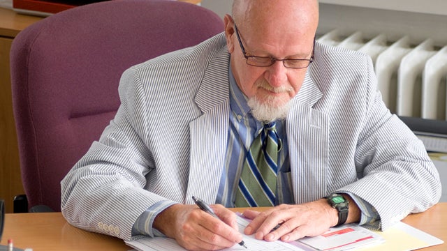 Senior businessman working in office 