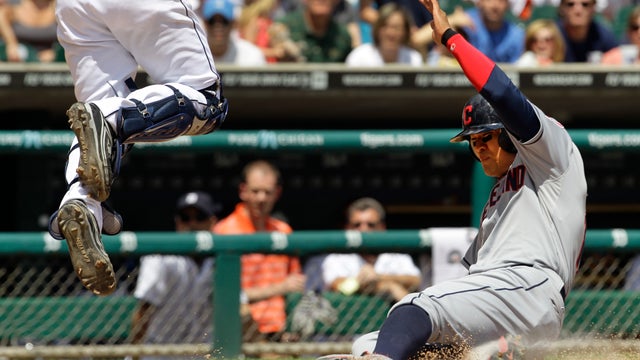 Shin-Soo Choo slides safely into home plate  