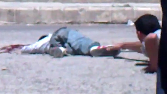 Alleged sniper shooting of young boy in Daraa 