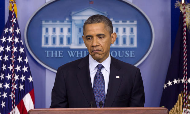 President Barack Obama pauses while talking about the economy 