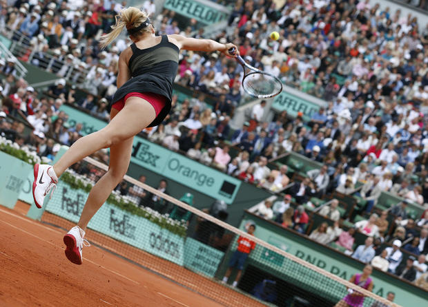 Maria Sharapova serves  
