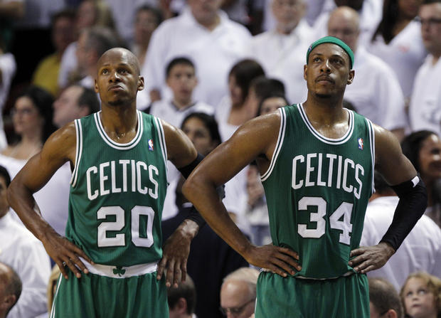Ray Allen (20) and Paul Pierce (34) look up at the scoreboard  