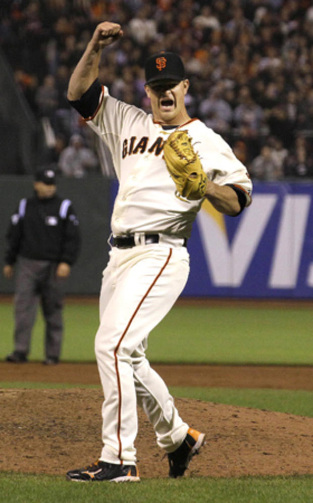 Matt Cain celebrates after the final out of the ninth inning  