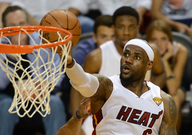 LeBron James of the Miami Heat goes to the basket 