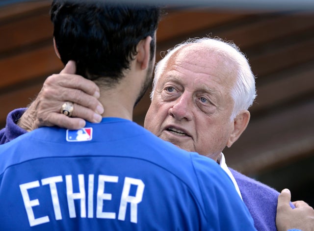 Tommy Lasorda gets a hug from Andre Ethier 