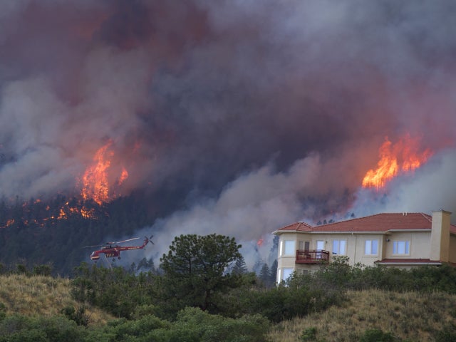 A helicopter tries to put out fire on the Waldo Canyon wildfire  