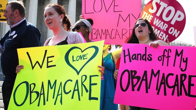Obamacare supporters demonstrate in front of the U.S. Supreme Court 