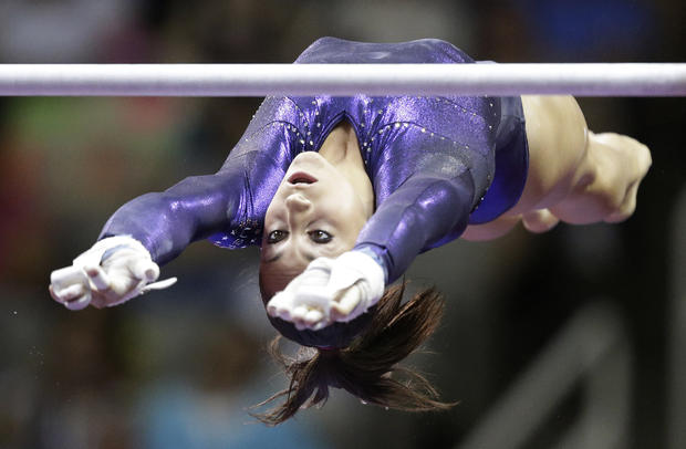 Jordyn Wieber competes on the uneven bars  