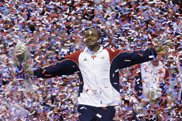 John Orozco dances in falling confetti after being named to the U.S. men's Olympic gymnastics team 