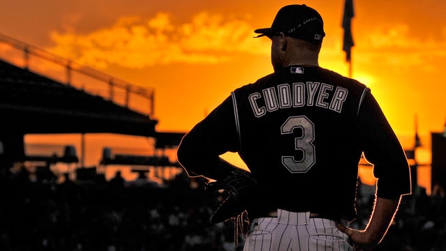 Michael Cuddyer watches during the seventh inning 