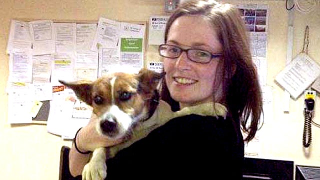 Deirdre Anglin is reunited with her Jack Russell terrier Patch Wednesday July 4, 2012 in Dublin, Ireland. 
