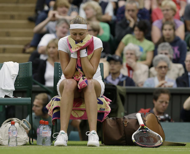 Petra Kvitova  waits between sets during a quarterfinals match 
