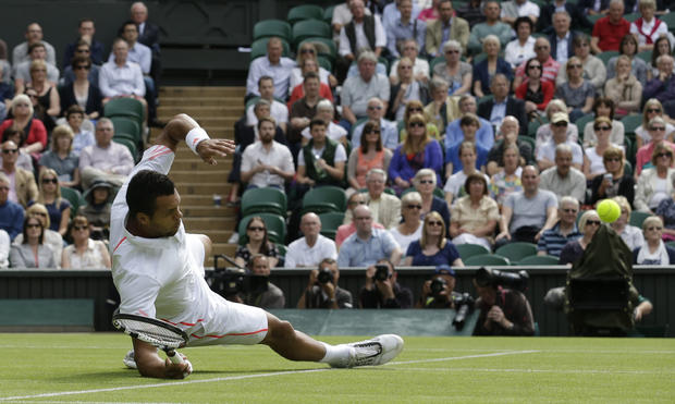 Jo-Wilfried Tsonga dives to try and play a shot  