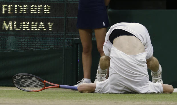 Andy Murray takes a tumble during the men's singles final match 